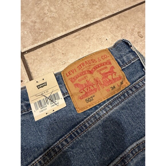 LEVIS Jeans Mens 34x32 502 Regular Taper Stretch Blue Denim Sits below Waist NEW - Picture 3 of 9